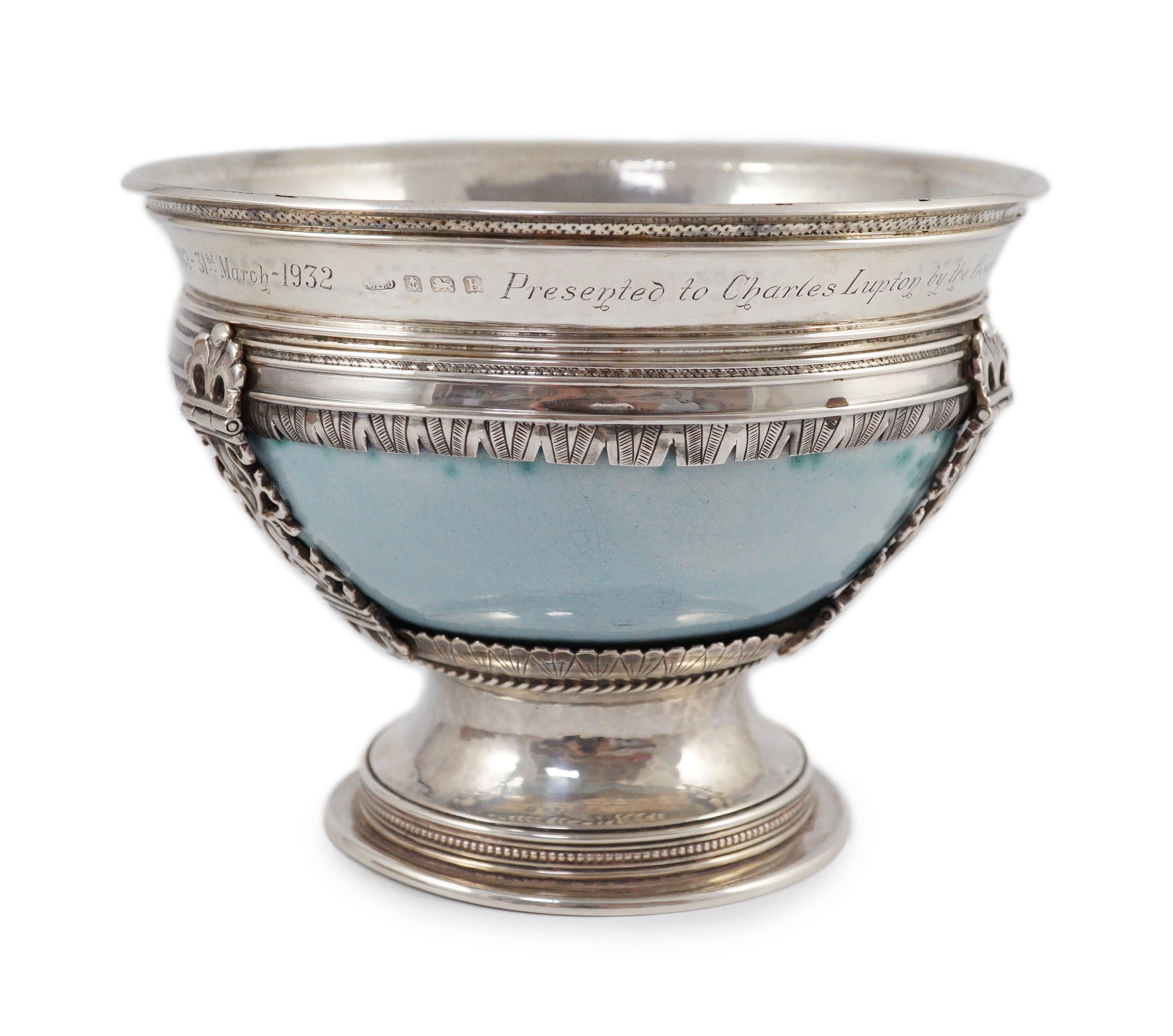 An Arts and Crafts silver mounted Ruskin pottery pedestal bowl, the silver mounts by A.E. Jones, Birmingham 1929, 16.5cm diameter